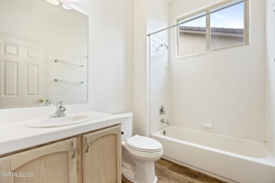 Located on the 4th hole of Dayton Valley Golf Club, this home on Dayton Valley Golf Club At Legado in Nevada - for sale on GolfHomes.com, golf home, golf lot
