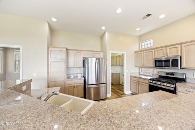 Located on the 4th hole of Dayton Valley Golf Club, this home on Dayton Valley Golf Club At Legado in Nevada - for sale on GolfHomes.com, golf home, golf lot