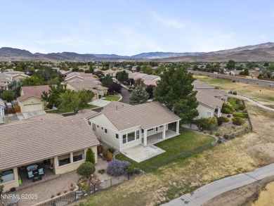 Located on the 4th hole of Dayton Valley Golf Club, this home on Dayton Valley Golf Club At Legado in Nevada - for sale on GolfHomes.com, golf home, golf lot