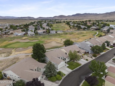 Located on the 4th hole of Dayton Valley Golf Club, this home on Dayton Valley Golf Club At Legado in Nevada - for sale on GolfHomes.com, golf home, golf lot