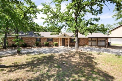 Positioned between the peaceful setting of Amon Carter Lake and on Twisted Oaks Golf Club in Texas - for sale on GolfHomes.com, golf home, golf lot