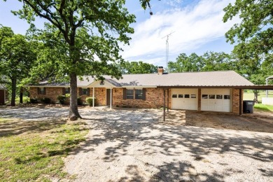 Positioned between the peaceful setting of Amon Carter Lake and on Twisted Oaks Golf Club in Texas - for sale on GolfHomes.com, golf home, golf lot