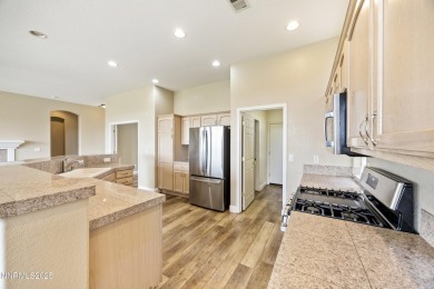 Located on the 4th hole of Dayton Valley Golf Club, this home on Dayton Valley Golf Club At Legado in Nevada - for sale on GolfHomes.com, golf home, golf lot