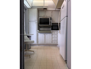 Welcome to this spacious 2 bed, 2 bath condo at 3250 N Palm Aire on Palm-Aire Country Club and Resort - The Oaks in Florida - for sale on GolfHomes.com, golf home, golf lot