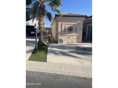 Beautiful & easy to care for stuccoed Park Model w/tile roof in on The Refuge Golf and Country Club in Arizona - for sale on GolfHomes.com, golf home, golf lot