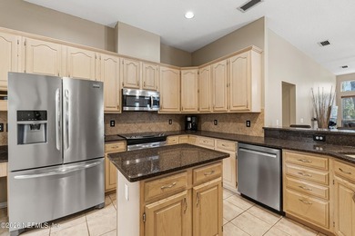 Perfect for entertaining as well as everyday living, this pool on Windsor Parke Golf Club in Florida - for sale on GolfHomes.com, golf home, golf lot