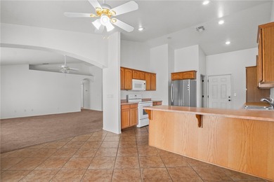 Located in a welcoming golf course community right off Route 66 on Valle Vista Golf Course in Arizona - for sale on GolfHomes.com, golf home, golf lot