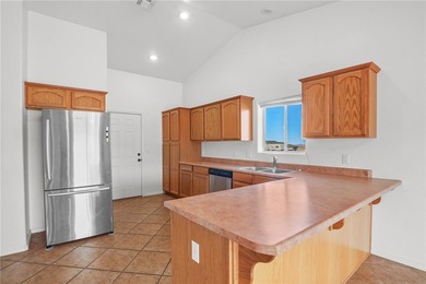 Located in a welcoming golf course community right off Route 66 on Valle Vista Golf Course in Arizona - for sale on GolfHomes.com, golf home, golf lot