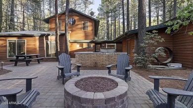 Imagine a home where every detail reflects a commitment to on Pinetop Lakes Country Club in Arizona - for sale on GolfHomes.com, golf home, golf lot