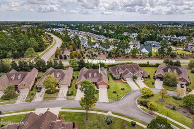 Experience elegant, low-maintenance living in this stunning on Cape Fear National At Brunswick Forest in North Carolina - for sale on GolfHomes.com, golf home, golf lot