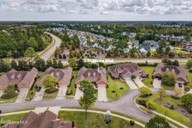 Experience elegant, low-maintenance living in this stunning on Cape Fear National At Brunswick Forest in North Carolina - for sale on GolfHomes.com, golf home, golf lot