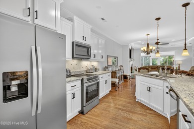 Experience elegant, low-maintenance living in this stunning on Cape Fear National At Brunswick Forest in North Carolina - for sale on GolfHomes.com, golf home, golf lot