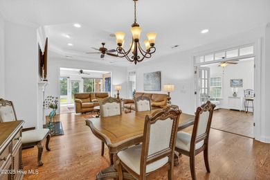 Experience elegant, low-maintenance living in this stunning on Cape Fear National At Brunswick Forest in North Carolina - for sale on GolfHomes.com, golf home, golf lot