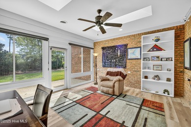 Experience elegant, low-maintenance living in this stunning on Cape Fear National At Brunswick Forest in North Carolina - for sale on GolfHomes.com, golf home, golf lot