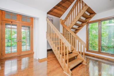 Step into a rare retreat in East Brunswick, this stunning 3532 on Tamarack Golf Course in New Jersey - for sale on GolfHomes.com, golf home, golf lot