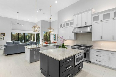 Welcome to an extraordinary, fully reimagined contemporary on Bocaire Country Club in Florida - for sale on GolfHomes.com, golf home, golf lot