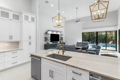 Welcome to an extraordinary, fully reimagined contemporary on Bocaire Country Club in Florida - for sale on GolfHomes.com, golf home, golf lot