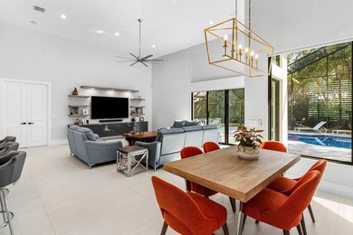 Welcome to an extraordinary, fully reimagined contemporary on Bocaire Country Club in Florida - for sale on GolfHomes.com, golf home, golf lot