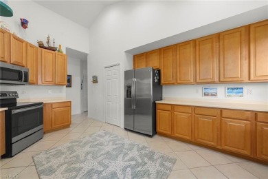 Private Elevator.  Two Car Garage.  Enjoy stunning long lake and on The Colony Golf and Country Club in Florida - for sale on GolfHomes.com, golf home, golf lot