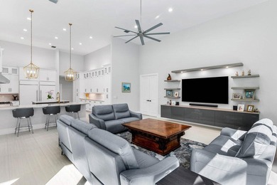 Welcome to an extraordinary, fully reimagined contemporary on Bocaire Country Club in Florida - for sale on GolfHomes.com, golf home, golf lot