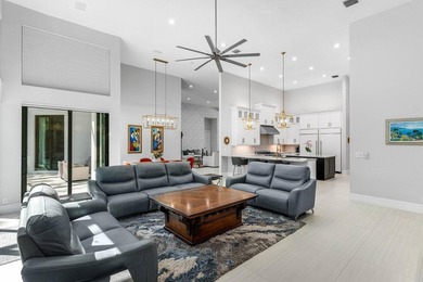 Welcome to an extraordinary, fully reimagined contemporary on Bocaire Country Club in Florida - for sale on GolfHomes.com, golf home, golf lot