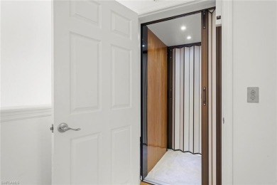 Private Elevator.  Two Car Garage.  Enjoy stunning long lake and on The Colony Golf and Country Club in Florida - for sale on GolfHomes.com, golf home, golf lot