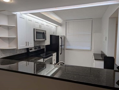 BACK to ACTIVE REDUCED TO SELL!! Beautifully updated and on Pine Island Ridge Country Club in Florida - for sale on GolfHomes.com, golf home, golf lot