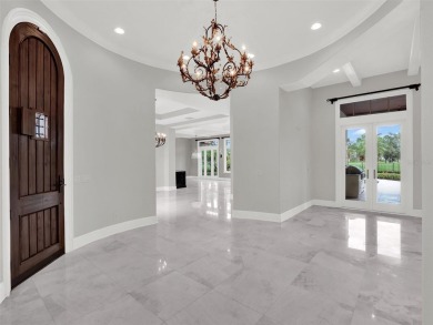 A perfect blend of Mediterranean and contemporary Transitional on Lake Nona Golf Club, Inc. in Florida - for sale on GolfHomes.com, golf home, golf lot