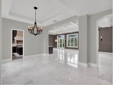 A perfect blend of Mediterranean and contemporary Transitional on Lake Nona Golf Club, Inc. in Florida - for sale on GolfHomes.com, golf home, golf lot