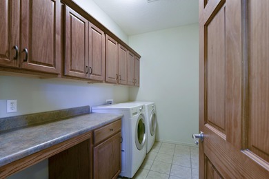 Charming home in this beautiful golf course community. there is on Ledgestone Country Club and Golf Course in Missouri - for sale on GolfHomes.com, golf home, golf lot