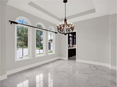 A perfect blend of Mediterranean and contemporary Transitional on Lake Nona Golf Club, Inc. in Florida - for sale on GolfHomes.com, golf home, golf lot