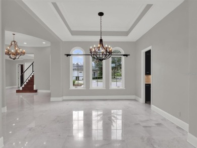 A perfect blend of Mediterranean and contemporary Transitional on Lake Nona Golf Club, Inc. in Florida - for sale on GolfHomes.com, golf home, golf lot