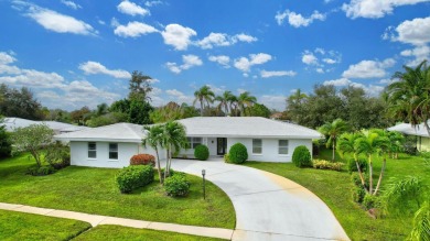 Panoramic golf and lake views abound at this Sandpiper Bay gem! on The Saints At Port St Lucie Golf Course in Florida - for sale on GolfHomes.com, golf home, golf lot