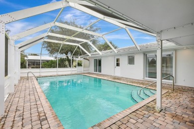 Panoramic golf and lake views abound at this Sandpiper Bay gem! on The Saints At Port St Lucie Golf Course in Florida - for sale on GolfHomes.com, golf home, golf lot