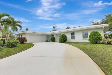 Panoramic golf and lake views abound at this Sandpiper Bay gem! on The Saints At Port St Lucie Golf Course in Florida - for sale on GolfHomes.com, golf home, golf lot