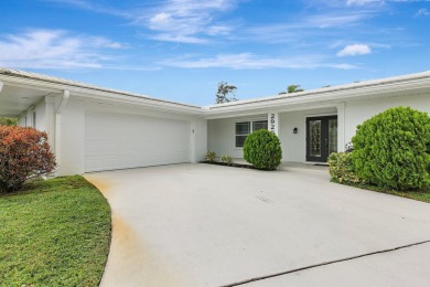 Panoramic golf and lake views abound at this Sandpiper Bay gem! on The Saints At Port St Lucie Golf Course in Florida - for sale on GolfHomes.com, golf home, golf lot