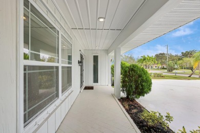 Panoramic golf and lake views abound at this Sandpiper Bay gem! on The Saints At Port St Lucie Golf Course in Florida - for sale on GolfHomes.com, golf home, golf lot