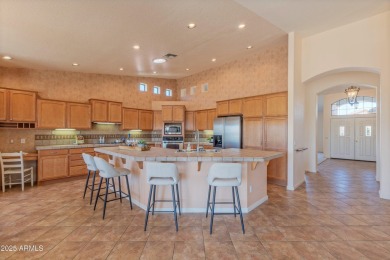 STUNNING VIEWS! Enjoy golf, lake, & mountain views from the on Tuscany Falls At Pebble Creek in Arizona - for sale on GolfHomes.com, golf home, golf lot