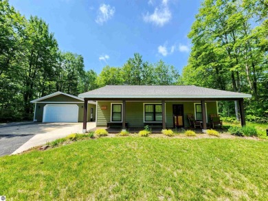 Built in 2018, this charming 3 bedroom, 2 bath ranch-style home on Lakes of the North Deer Run Golf Course in Michigan - for sale on GolfHomes.com, golf home, golf lot