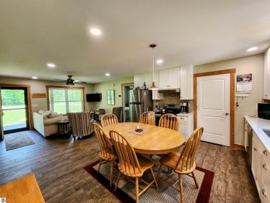 Built in 2018, this charming 3 bedroom, 2 bath ranch-style home on Lakes of the North Deer Run Golf Course in Michigan - for sale on GolfHomes.com, golf home, golf lot