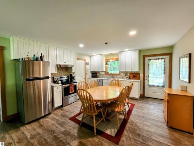 Built in 2018, this charming 3 bedroom, 2 bath ranch-style home on Lakes of the North Deer Run Golf Course in Michigan - for sale on GolfHomes.com, golf home, golf lot