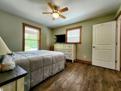 Built in 2018, this charming 3 bedroom, 2 bath ranch-style home on Lakes of the North Deer Run Golf Course in Michigan - for sale on GolfHomes.com, golf home, golf lot