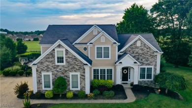 Experience elegance, comfort, and resort-style living in the on  in Ohio - for sale on GolfHomes.com, golf home, golf lot