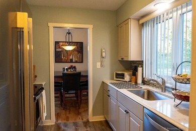 EXCEPTIONAL FIRST FLOOR END UNIT WITH GOLF COURSE FRONTAGE AND on  in Connecticut - for sale on GolfHomes.com, golf home, golf lot