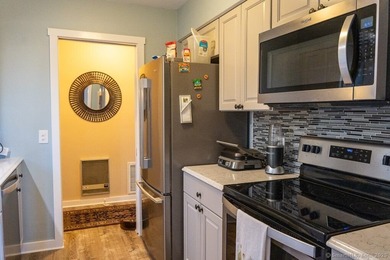 EXCEPTIONAL FIRST FLOOR END UNIT WITH GOLF COURSE FRONTAGE AND on  in Connecticut - for sale on GolfHomes.com, golf home, golf lot