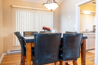 EXCEPTIONAL FIRST FLOOR END UNIT WITH GOLF COURSE FRONTAGE AND on  in Connecticut - for sale on GolfHomes.com, golf home, golf lot