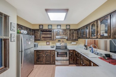 This spacious 4 bedroom, 3 bath home is located in the highly on Lake Naomi Timber Trails Golf Club in Pennsylvania - for sale on GolfHomes.com, golf home, golf lot