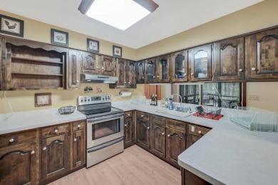 This spacious 4 bedroom, 3 bath home is located in the highly on Lake Naomi Timber Trails Golf Club in Pennsylvania - for sale on GolfHomes.com, golf home, golf lot