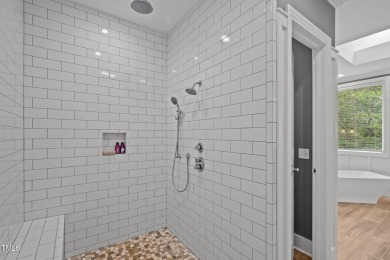 Crafted with care and brimming with delightful surprises, 32430 on Governors Club in North Carolina - for sale on GolfHomes.com, golf home, golf lot