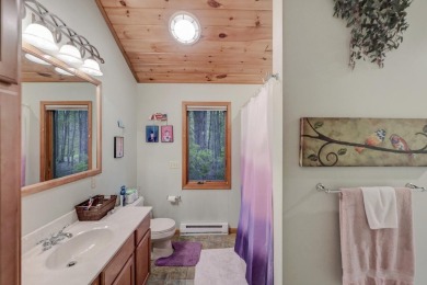 This spacious 4 bedroom, 3 bath home is located in the highly on Lake Naomi Timber Trails Golf Club in Pennsylvania - for sale on GolfHomes.com, golf home, golf lot